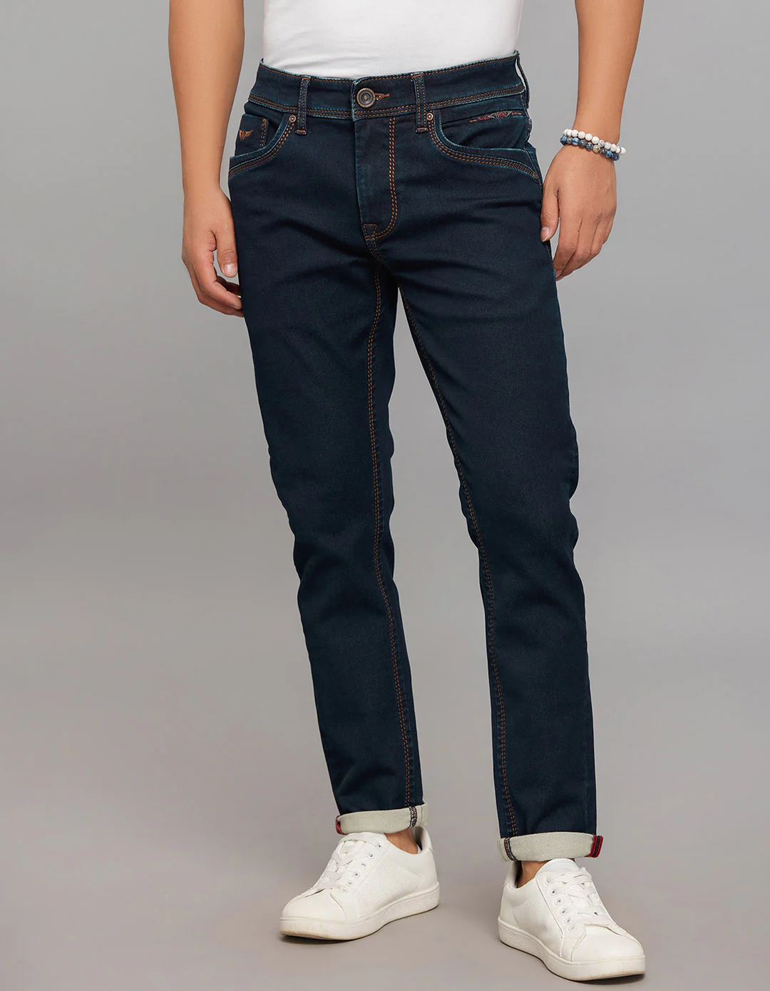 Dark Blue Low-Rise Tapered Ankle Length Knit Denim Jeans