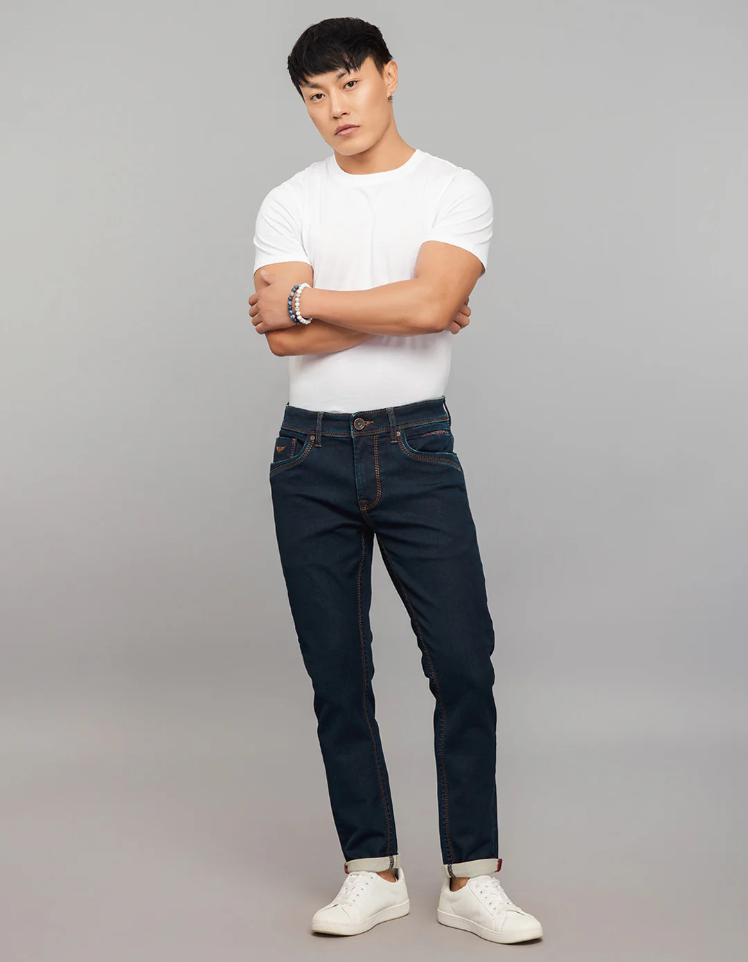 Dark Blue Low-Rise Tapered Ankle Length Knit Denim Jeans - Image 2