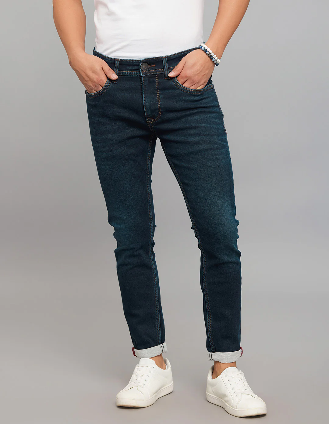 Dark Blue Low-Rise Tapered Ankle Length Knit Denim Jeans