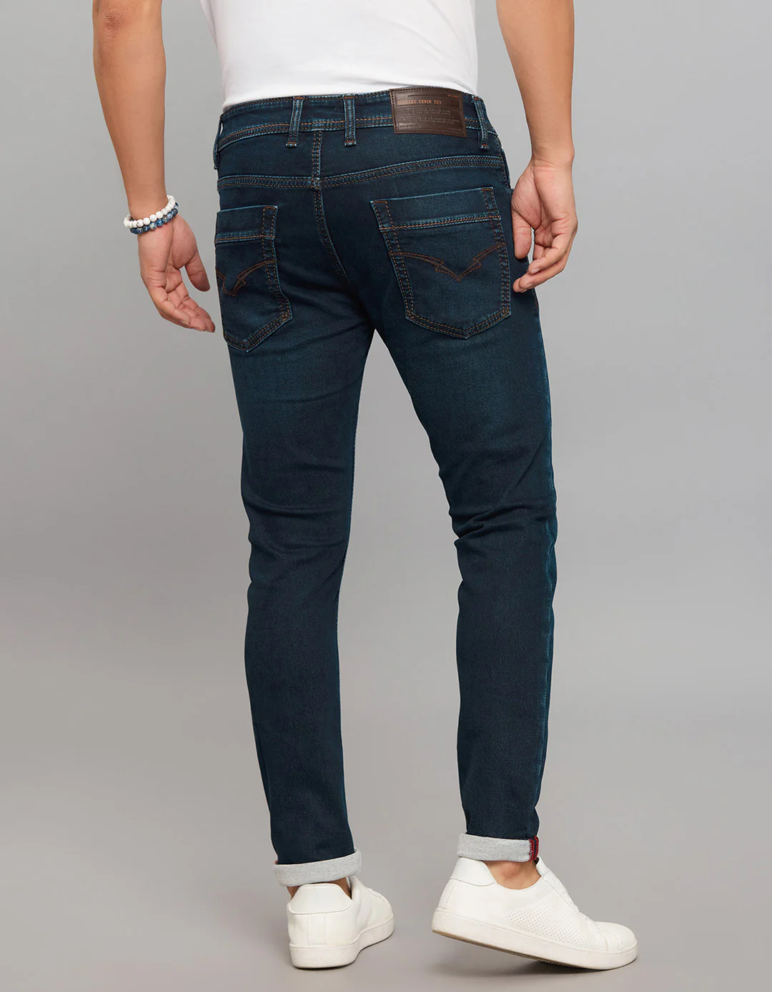 Dark Blue Low-Rise Tapered Ankle Length Knit Denim Jeans - Image 4