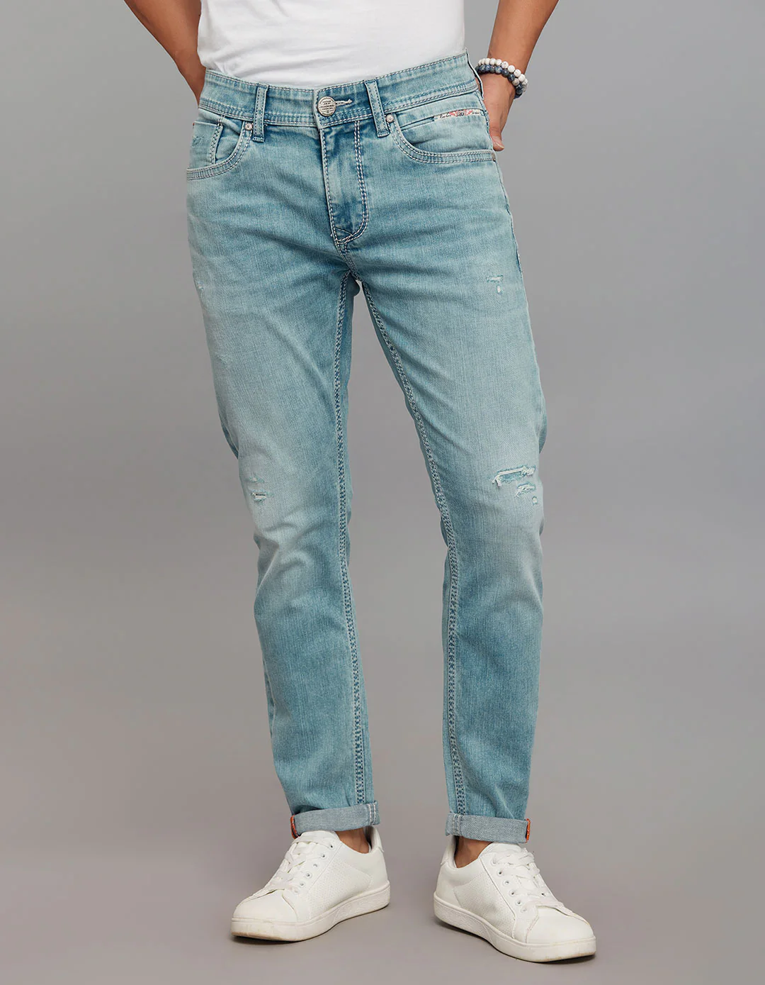 Light Blue Low-Rise Tapered Ankle Length Stretch Jeans