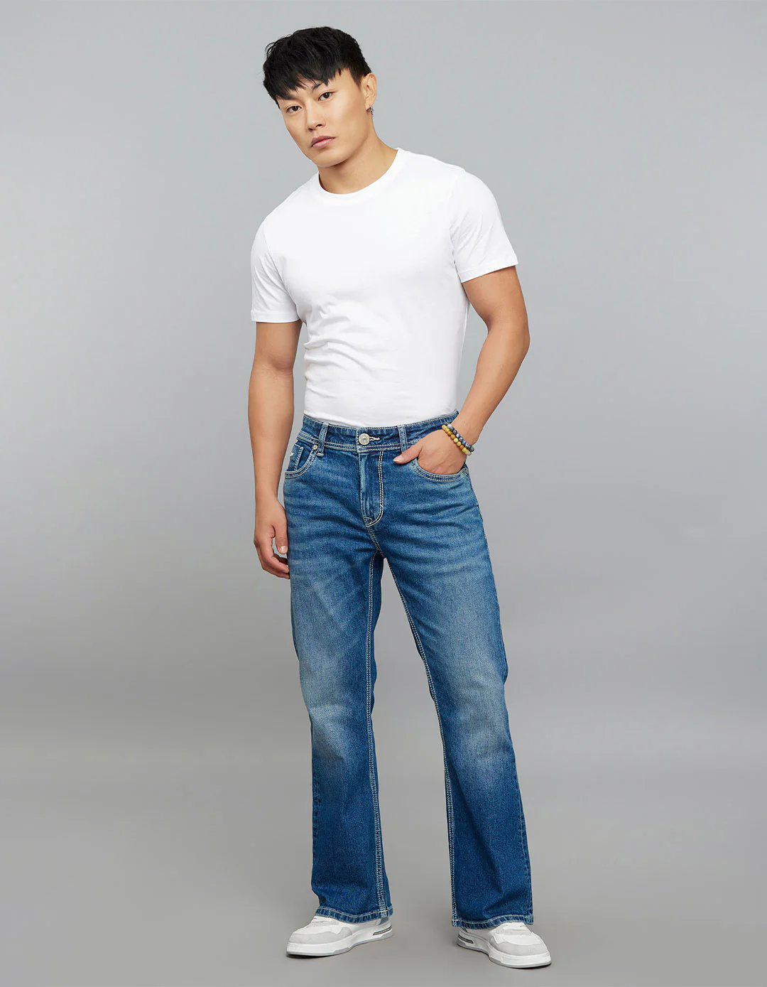 Med Blue Mid Rise Cropped Length Loose Boot Leg Stretch Jeans - Image 2