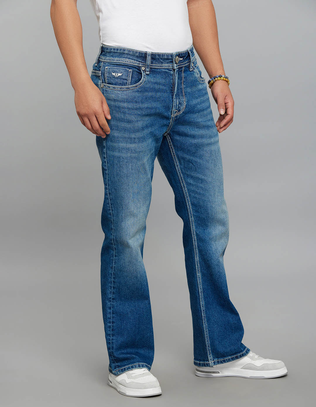 Med Blue Mid Rise Cropped Length Loose Boot Leg Stretch Jeans - Image 4