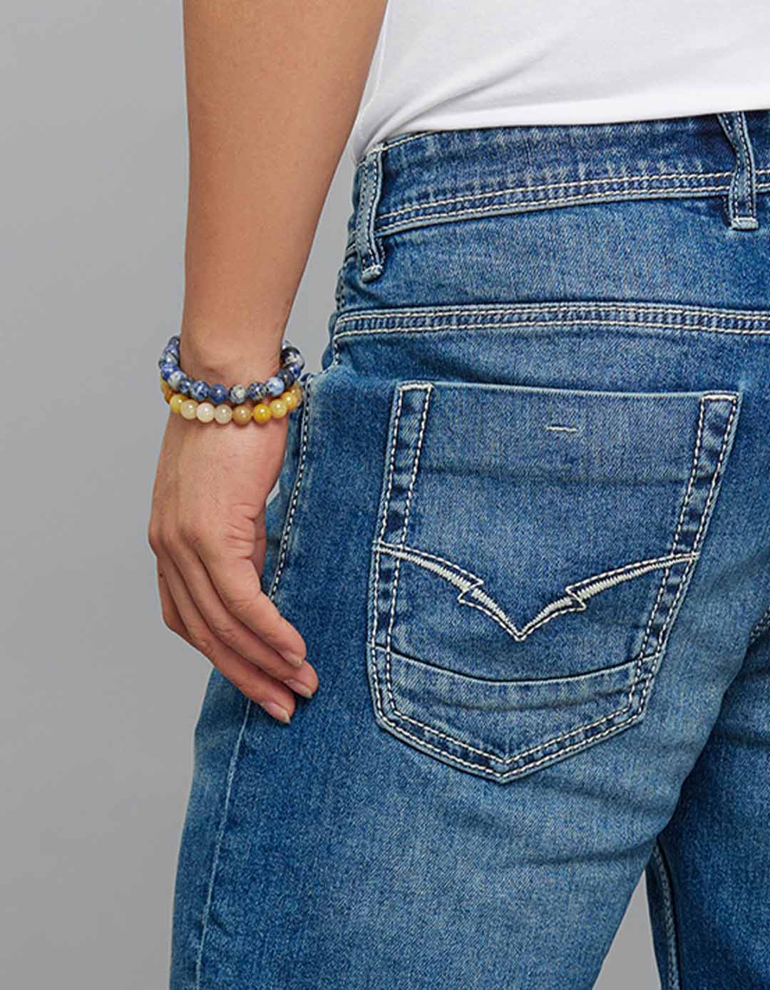Med Blue Mid Rise Cropped Length Loose Boot Leg Stretch Jeans - Image 6