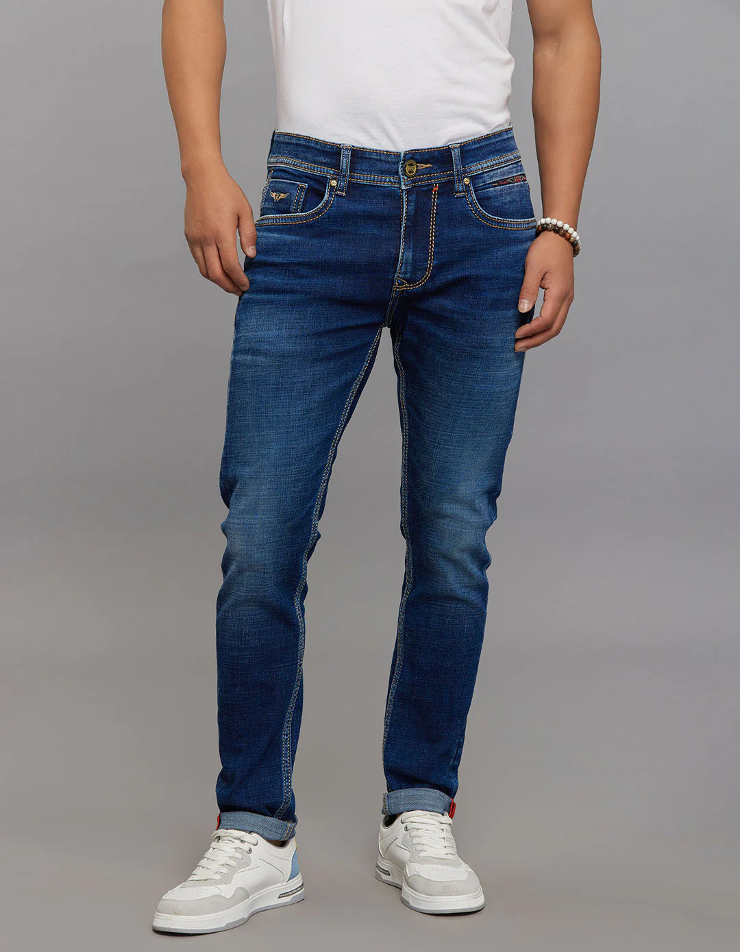 Medium Blue Low-Rise Tapered Ankle Length Stretch Jeans